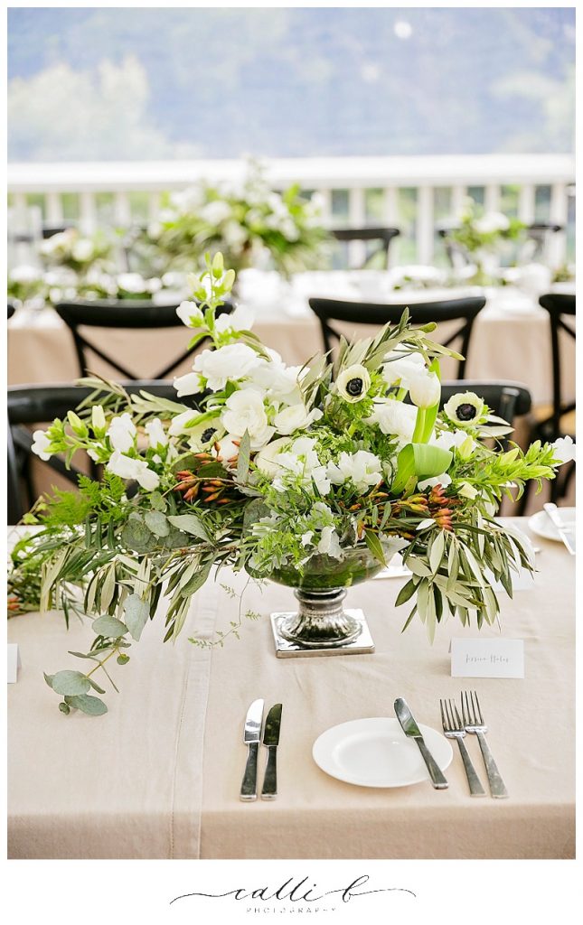 Chalice reception vases featuring olive branch and anemones