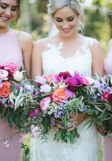 Bright rustic wedding bouquet featuring roses