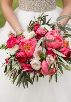 Wedding bouquet featuring coral peonies